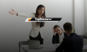 Photo of a lady yelling at her colleague, representing a toxic workplace environment