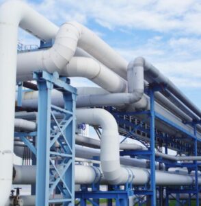Pipes at an industrial site, representing the industrial grid